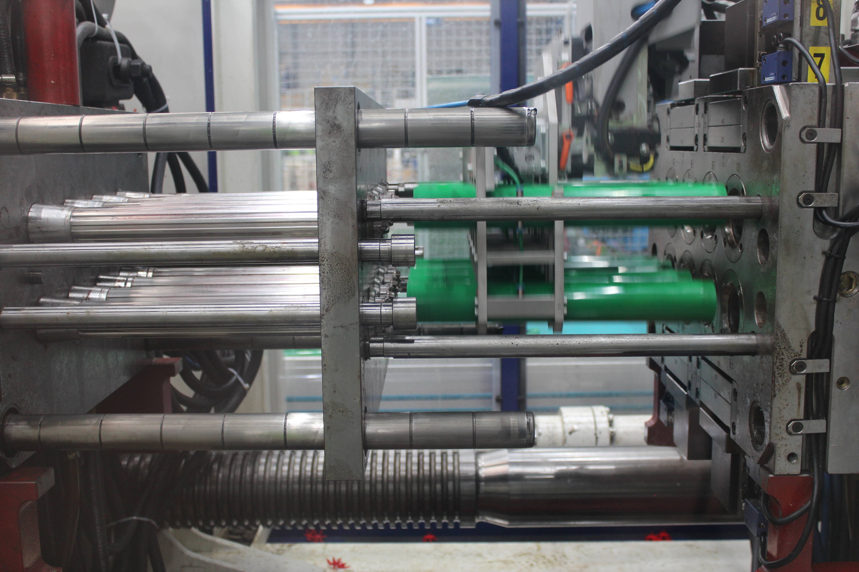 Injection molding machine producing standard QUADRO tubes 