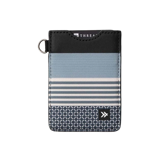 A stylish cardholder with blue and black striped design.