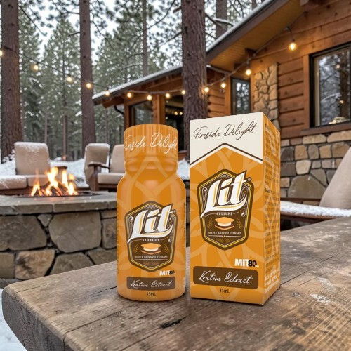 Bottle and box of Fit drink in a cozy, snowy cabin setting.