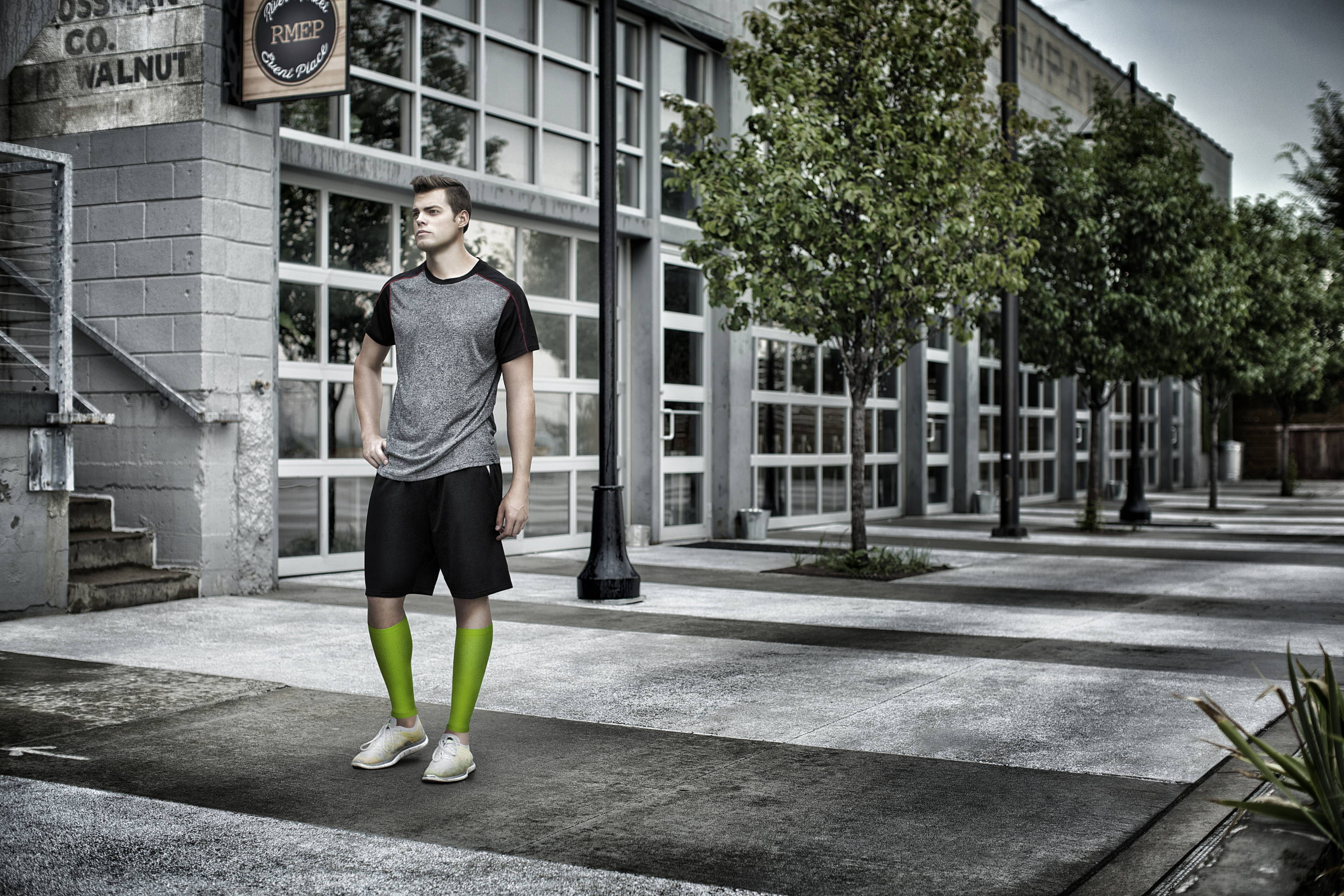 man standing, man wearing TheraSport leg compression sleeves