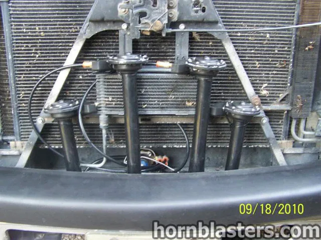 Train horn bells mounted behind the front grille