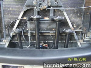 Train horn bells mounted behind the front grille