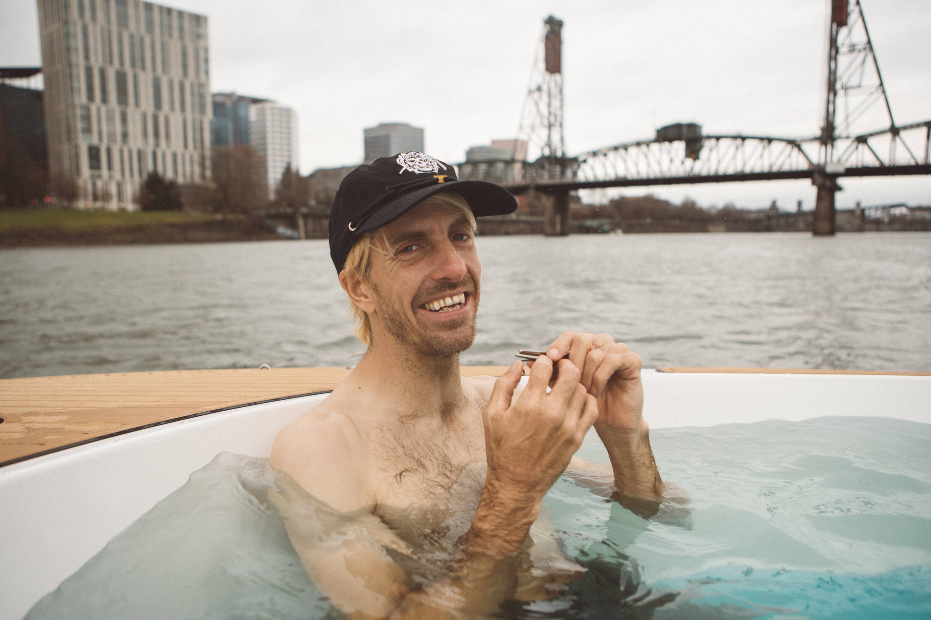 Aaron Homoki in hot tub 