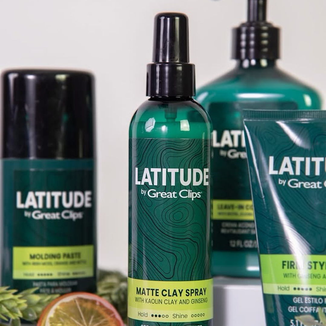 Three hair care products from Latitude by Great Clips on a surface.