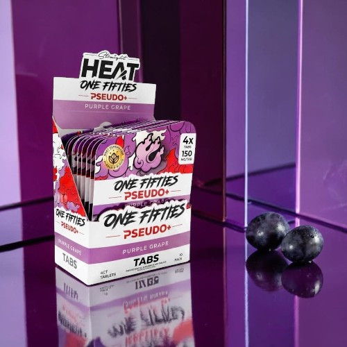 Box of dietary supplement tabs on a reflective surface with dark berries.