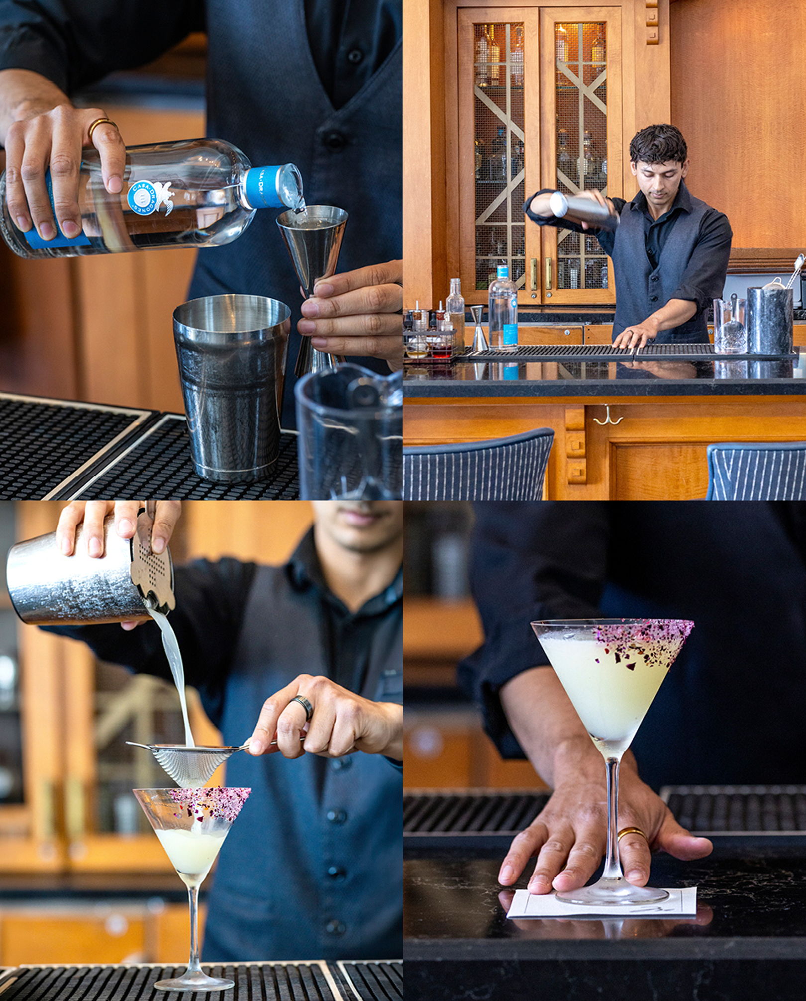 Bartender preparing and serving a cocktail in a bar setting.
