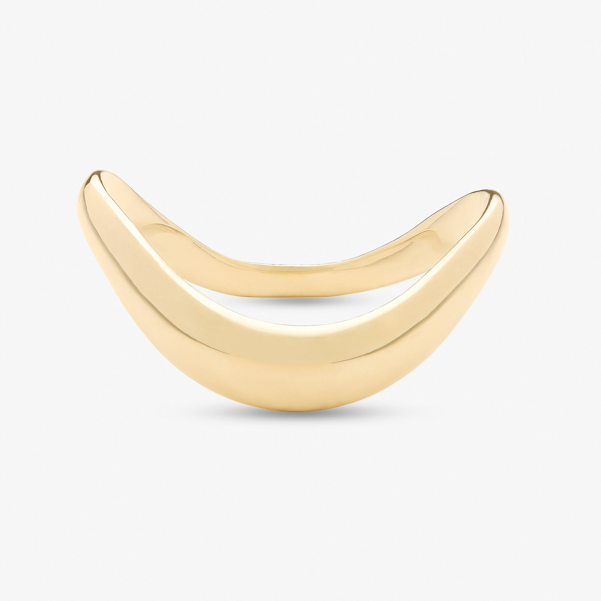 Polished yellow gold statement ring with a smooth, sculptural domed design.