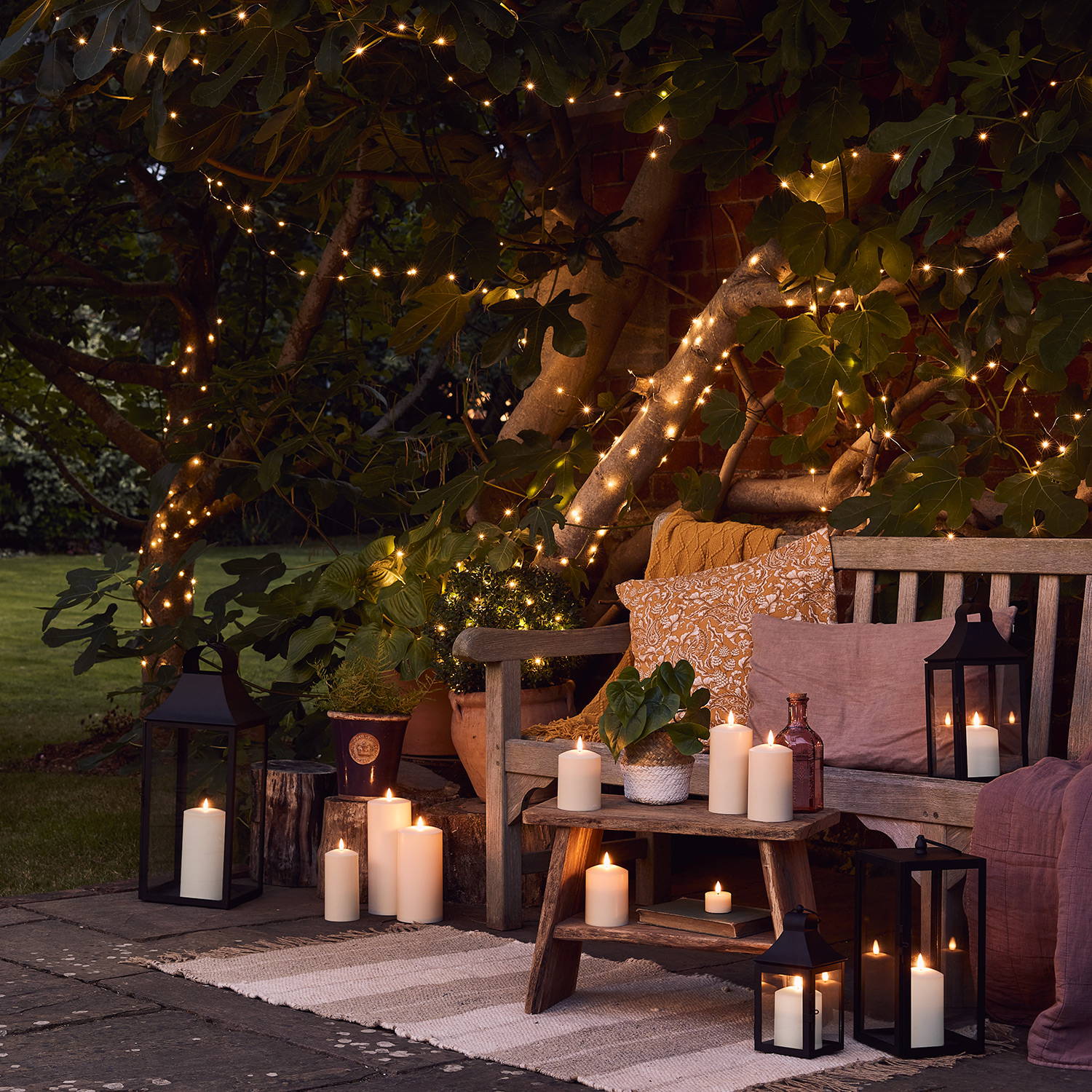 Garden bench illuminated with outdoor lights