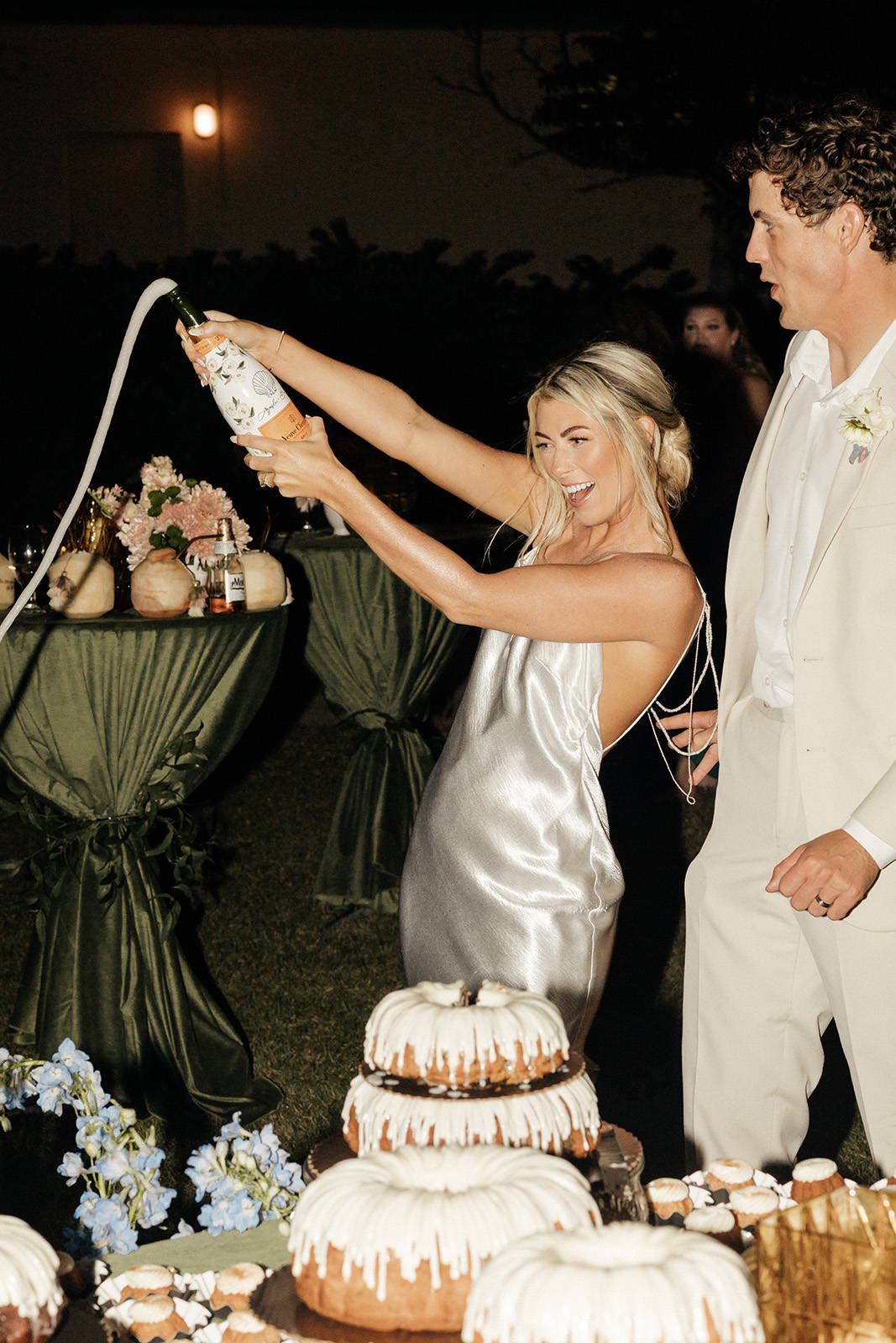 Bride pouring champagne 
