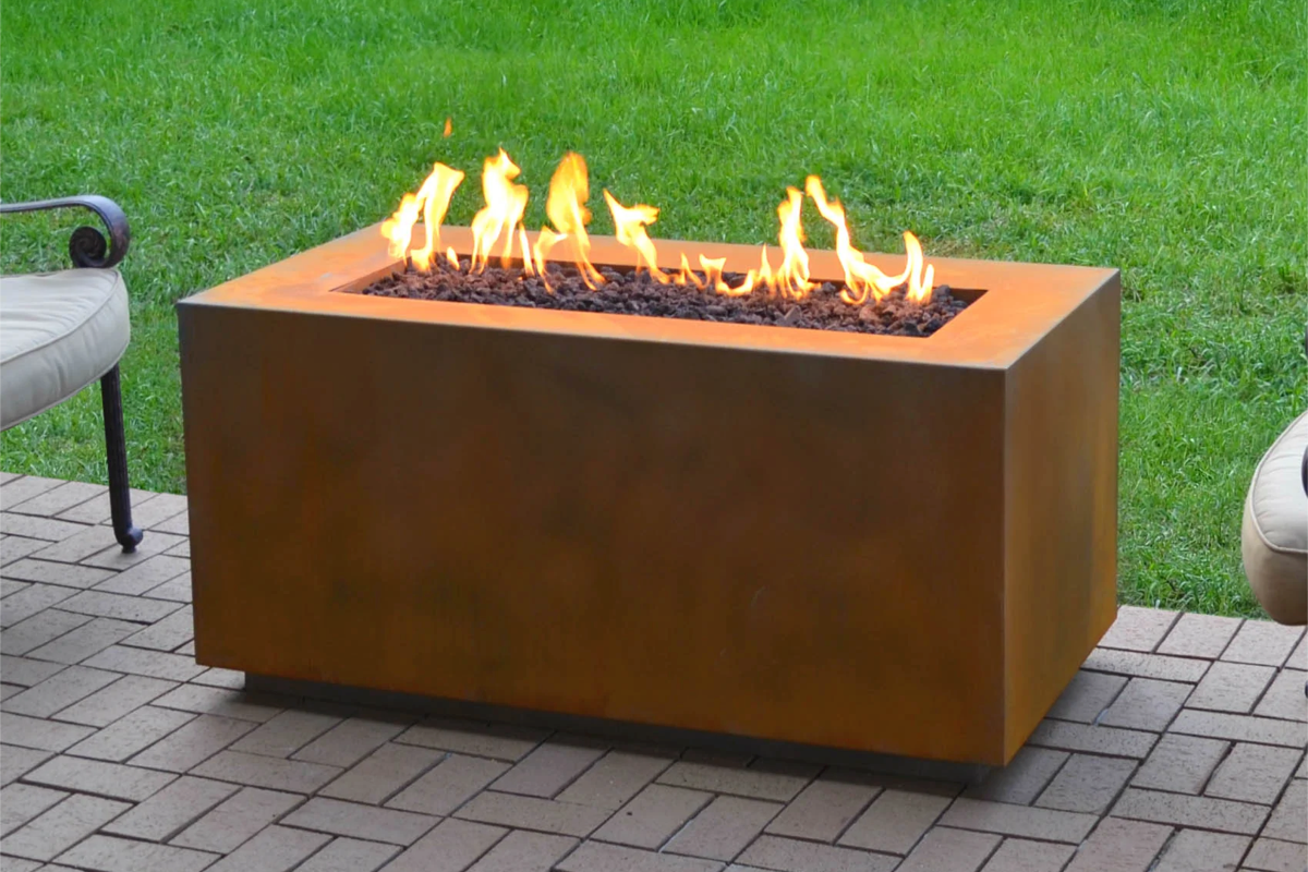 Boxhill's Pismo Fire Pit Table shown in corten steel is fully customizable. 