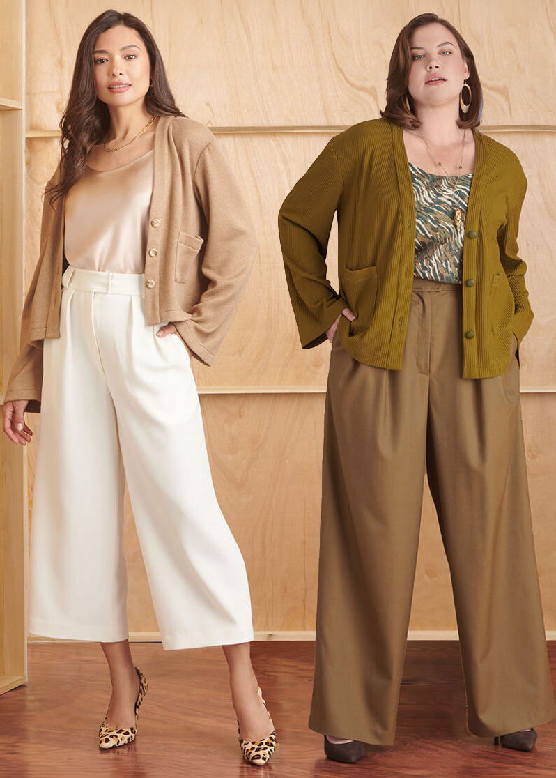 Two women modeling stylish outfits against a wooden background.