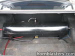 Black cylindrical air tank mounted horizontal trunk floor 2001 Toyota Corolla K5LA train horn gallery photo 12
