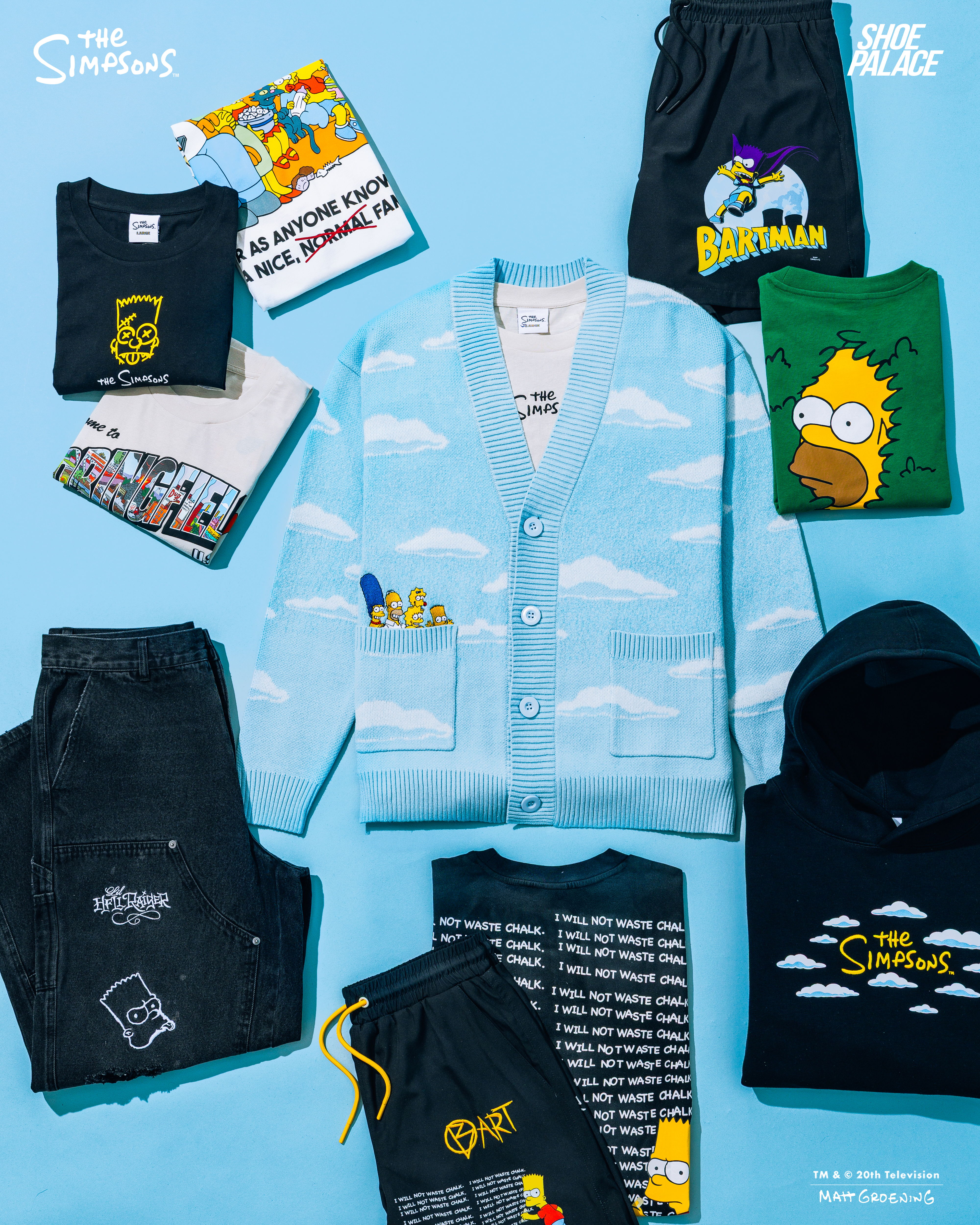 A flat lay of clothing items featuring The Simpsons characters and designs.