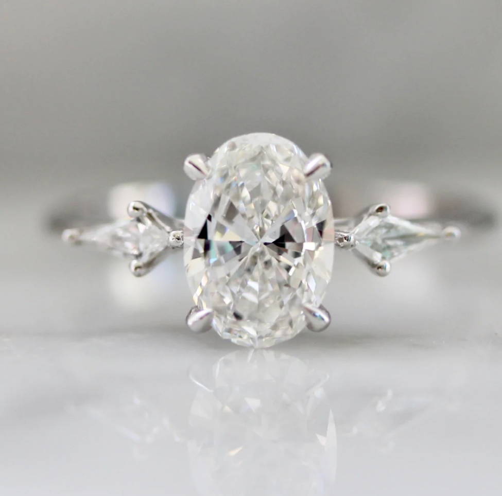 3 stone oval engagement ring diamond