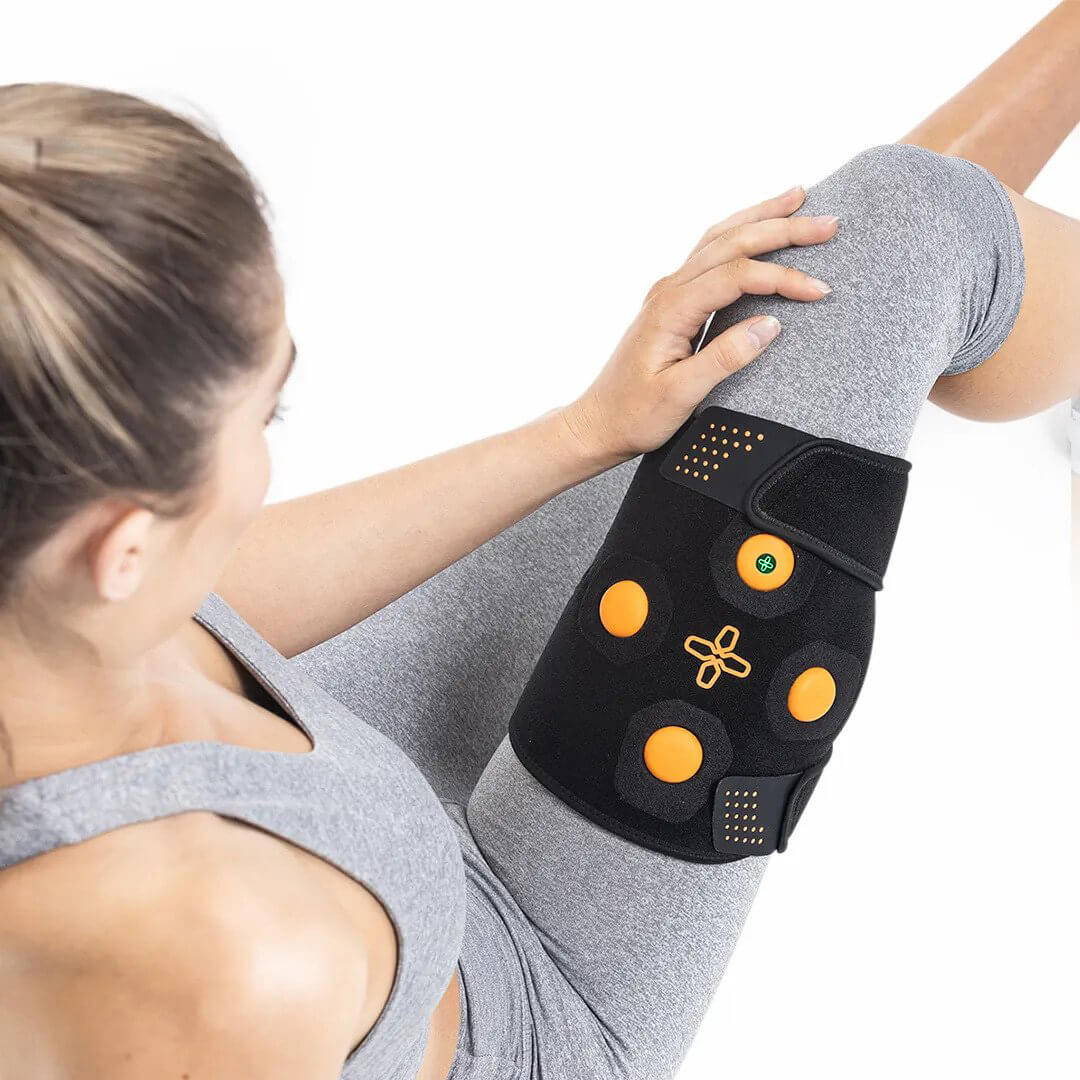 Myovolt vibration therapy sports brace for relief of pain and stiffness in leg muscles.