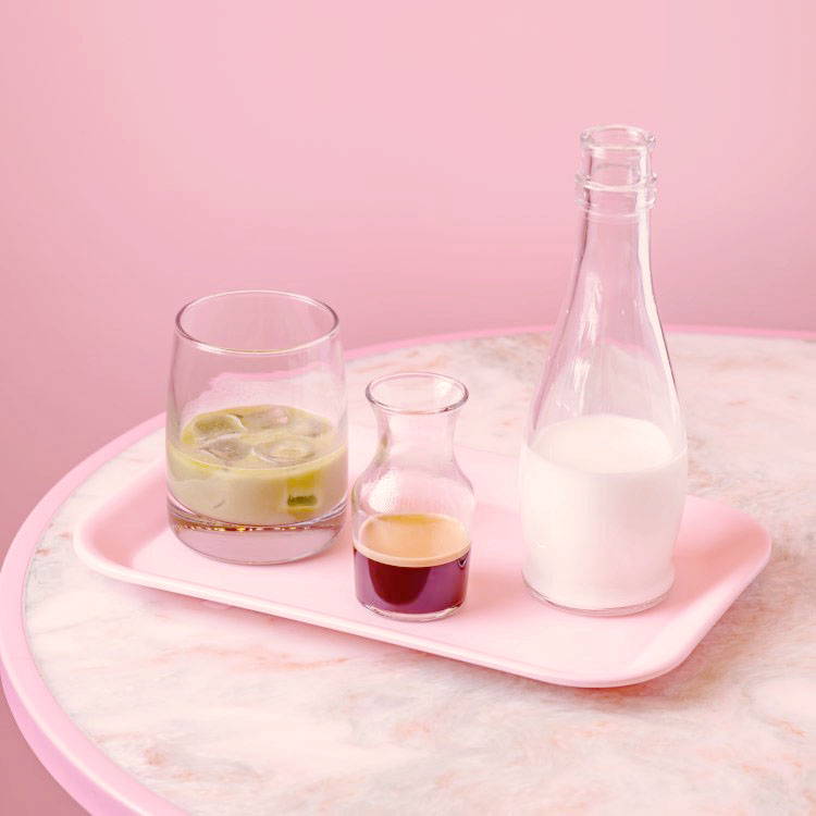 Pistachio Iced Spanish Latte served on pink tray