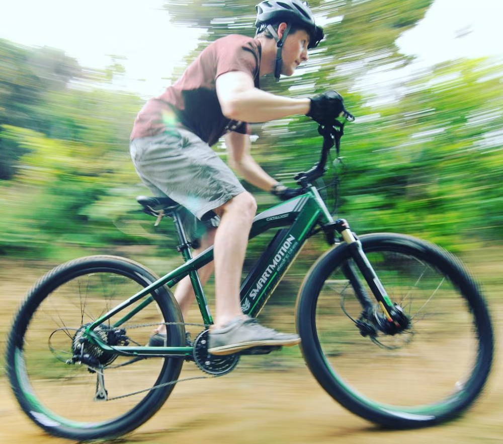 active rider on electric bike for Brisbane hills and city commuting