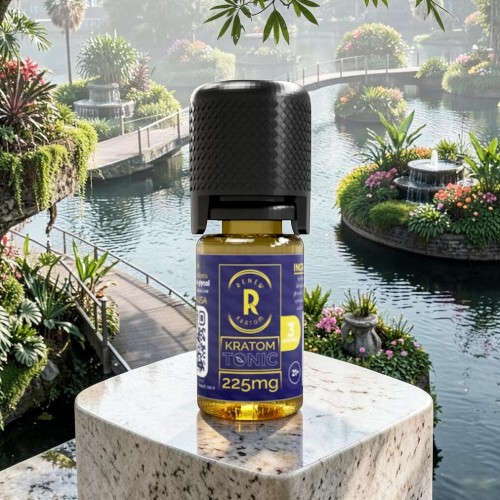 Bottle of oil on a stone table by a serene garden pond.