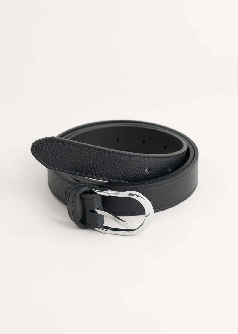 A black leather belt with a silver buckle
