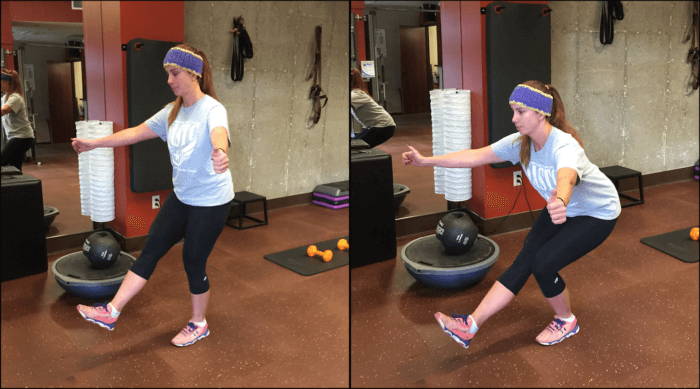 A woman performs a perfect squat.