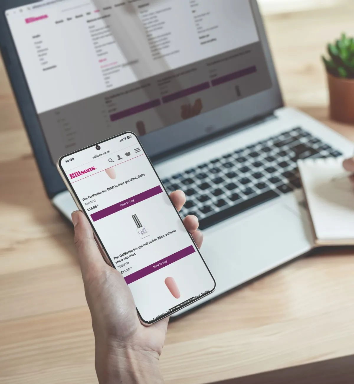 Person on the Ellisons website on their mobile phone and laptop.