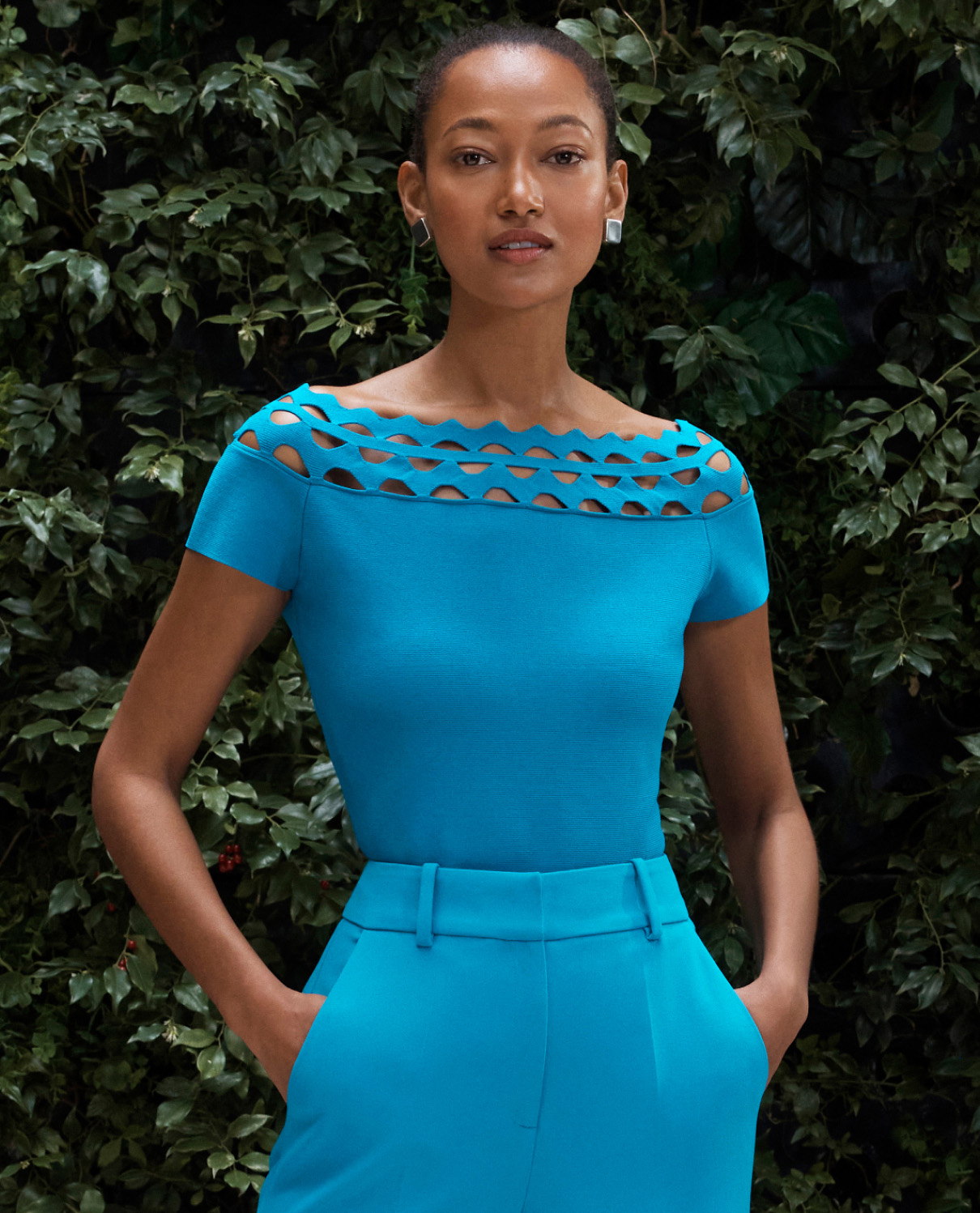 Model wearing turquoise Porto top