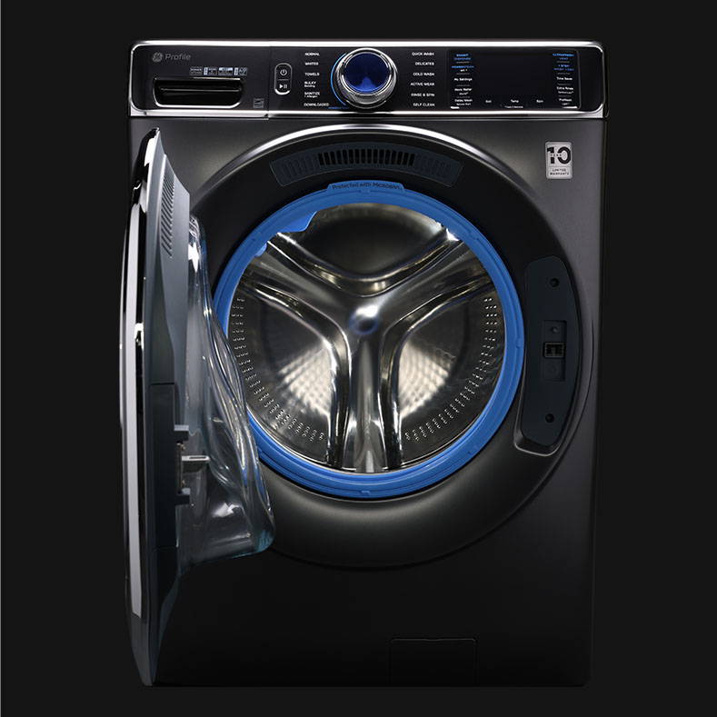 Dramatic photo of the GE Profile Front Load washer with door open, with Microban Technology