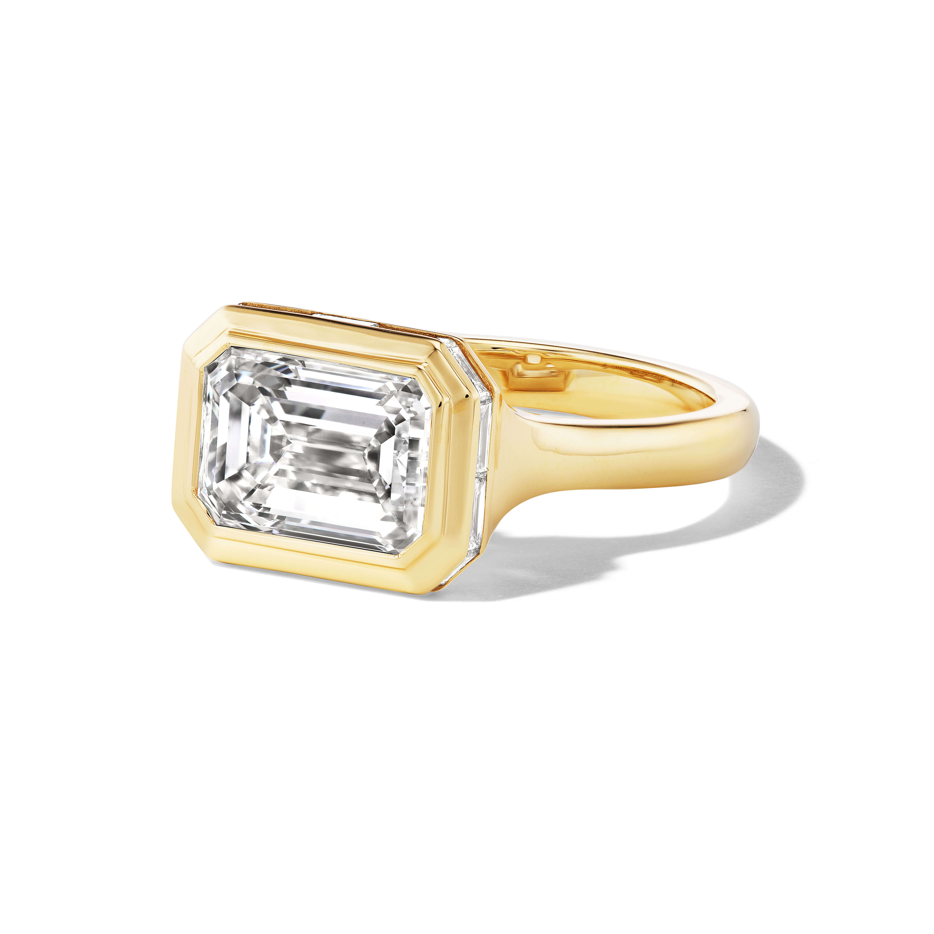 bezel set emerald cut engagement ring