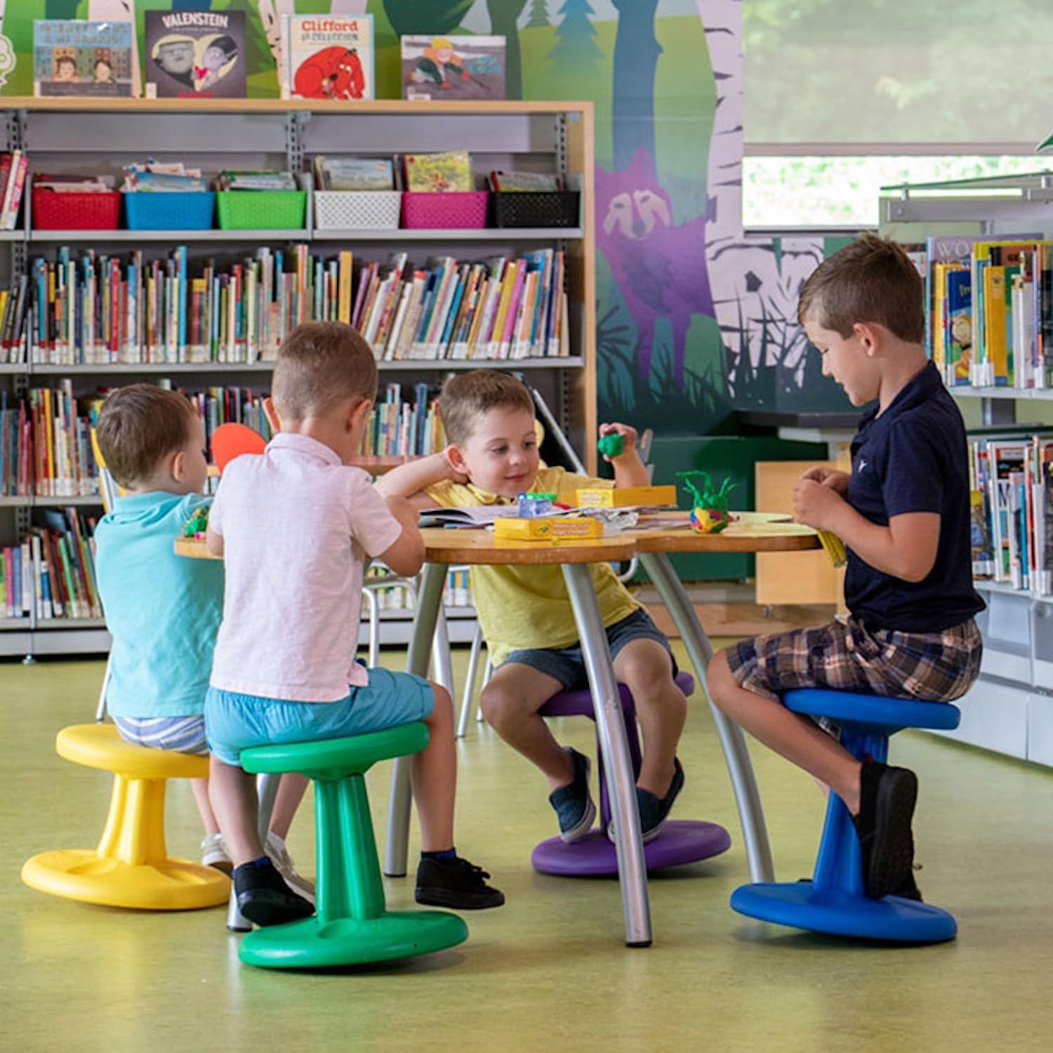 Kids sitting on Kore Design wobble stools