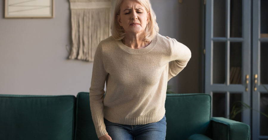 senior woman arthritis back pain