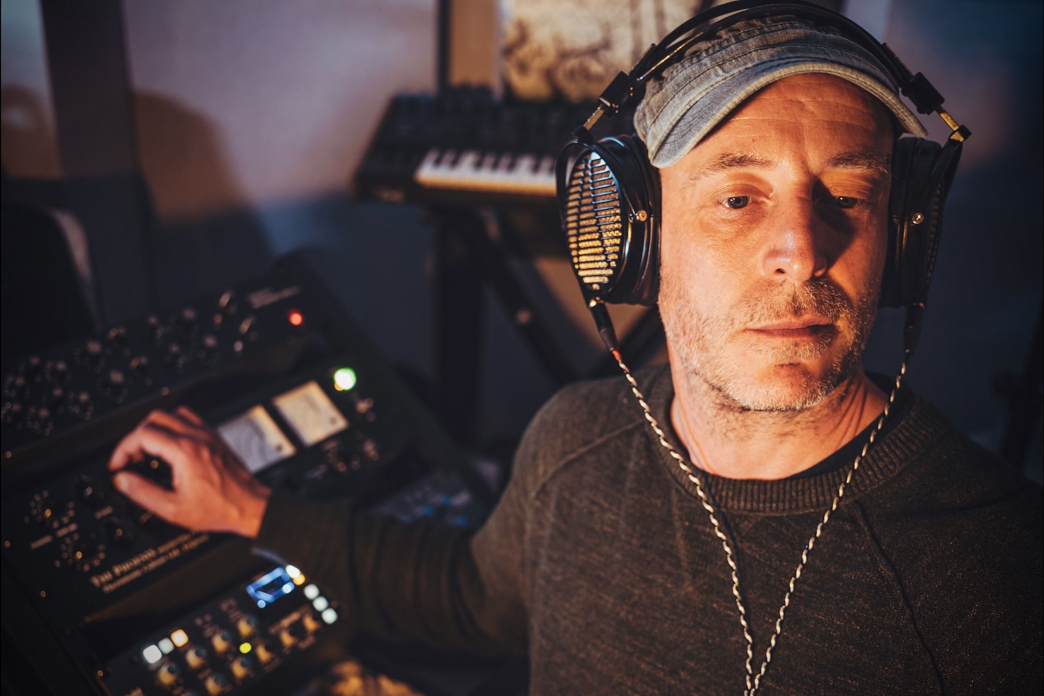 Alex Bonney wearing Audeze LCD-4z mixing in the studio 