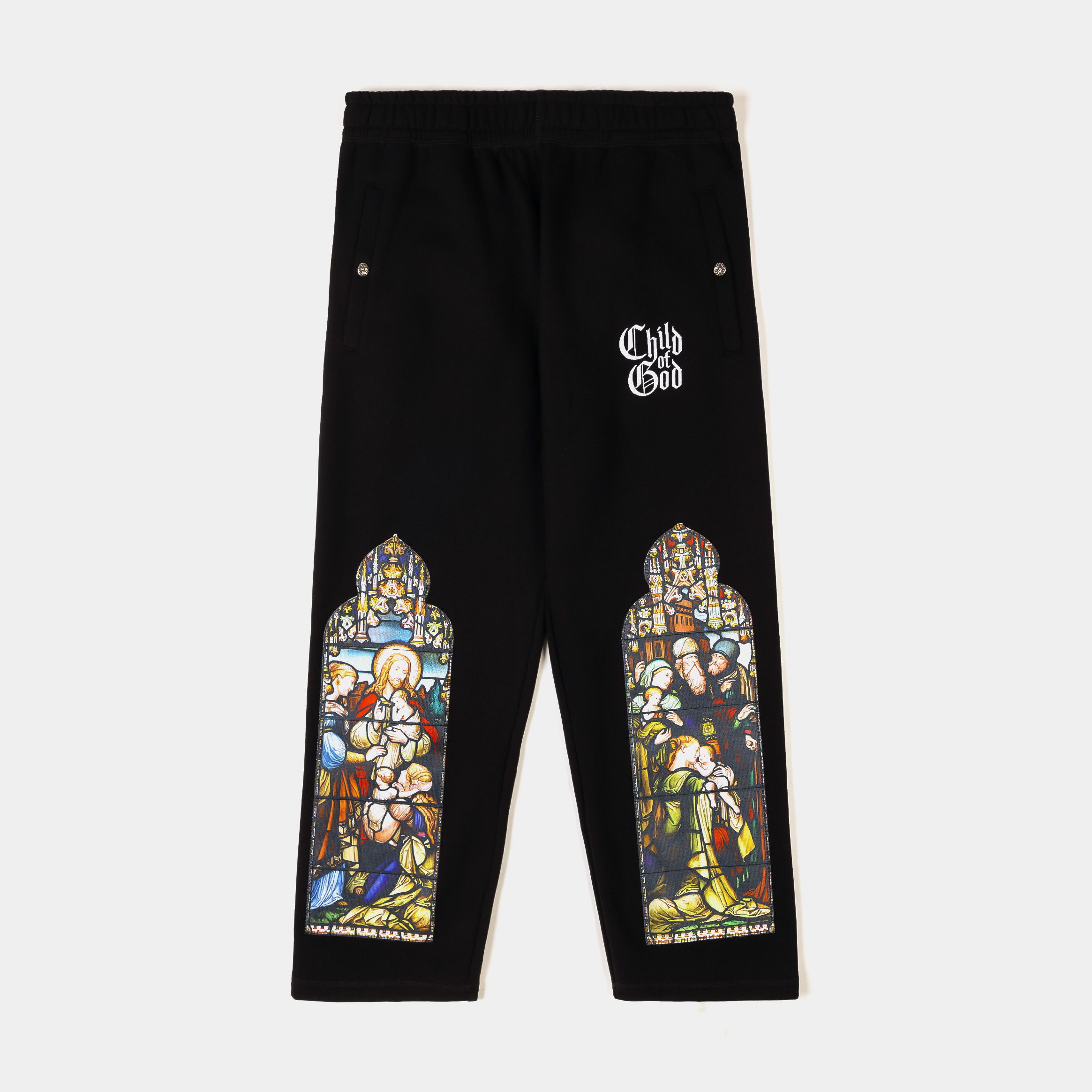 Black pants featuring colorful stained glass window designs on the sides.