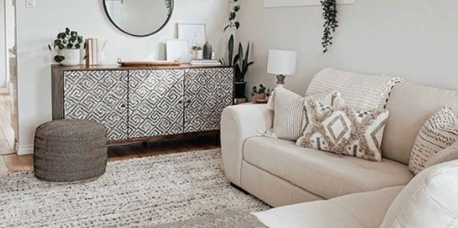 Living room decorated in neutral tones.