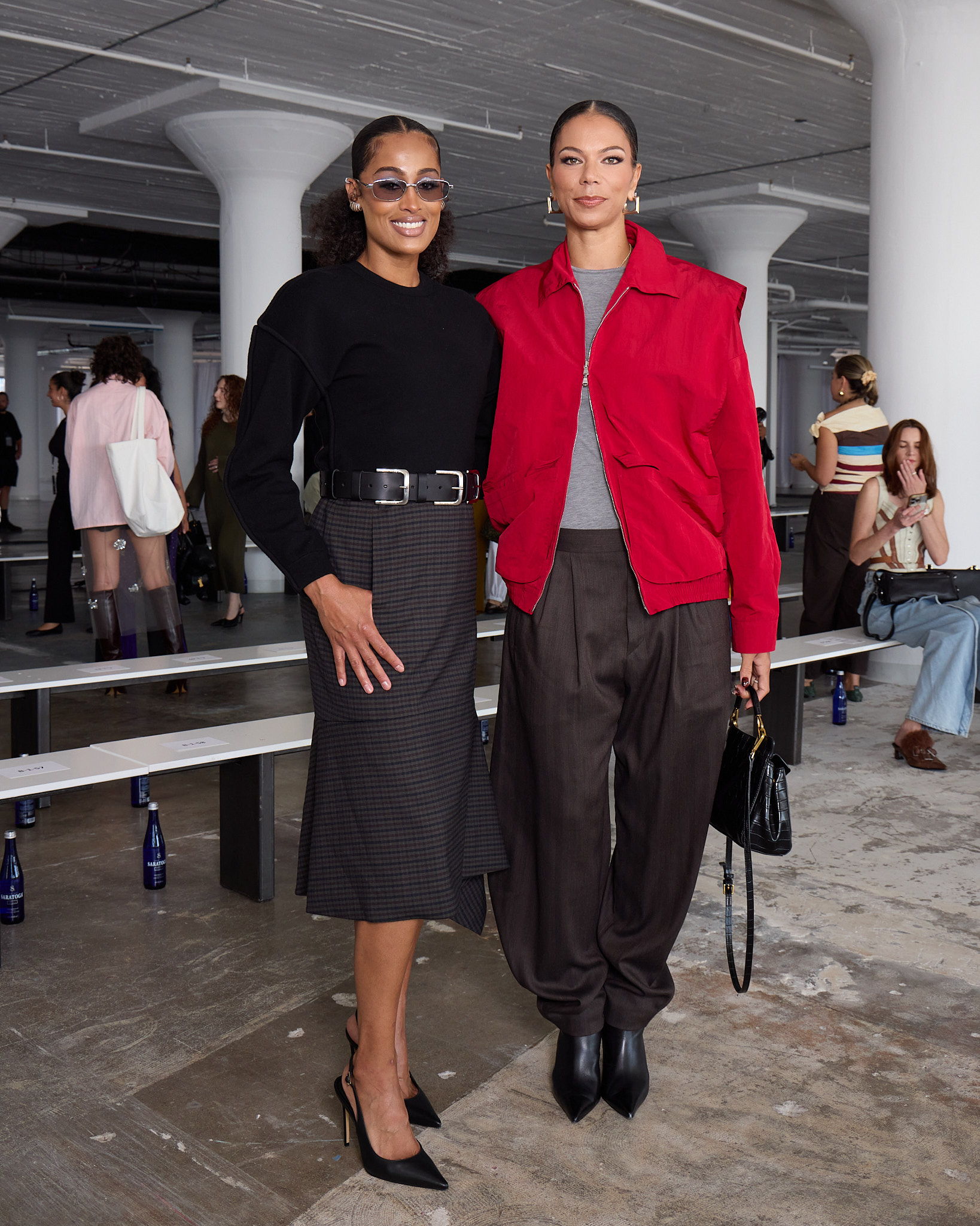 Alysha Clark and Skylar Diggins at Tibi new york fashion week runway show posing together.
