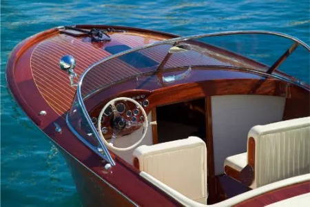 boat engine below deck with brown wood finish
