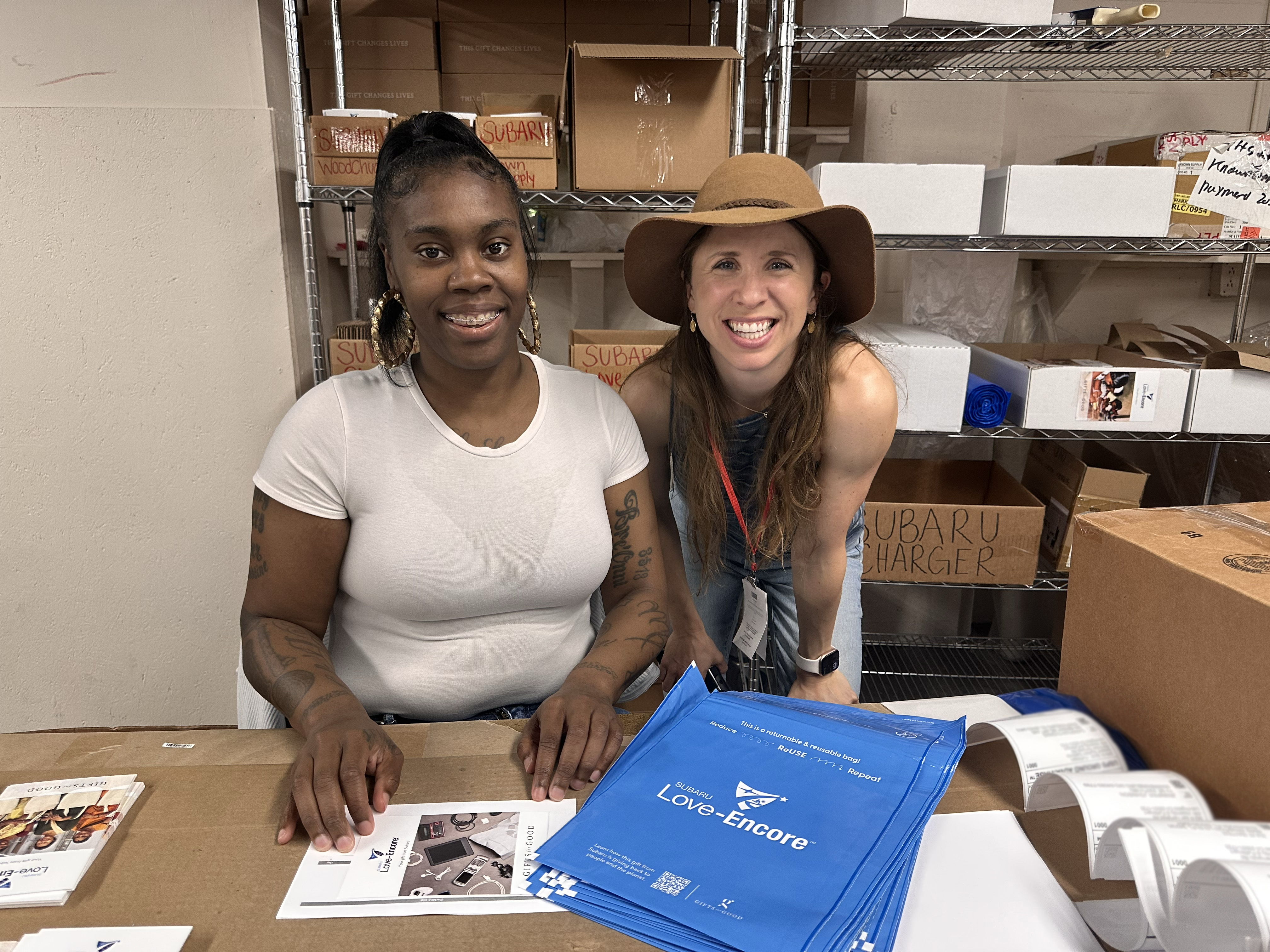 Laura Hertz (right) with Beverly, who is employed by Goodwill, specifically to manage fulfillment of Subaru Love-Encore gifts