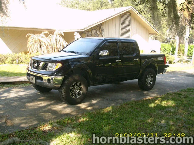 Front-three-quarter Shawn's 2005 Nissan Frontier mid-size pickup exterior grille headlights bumper Shocker XL train horn featured customer install photo 1