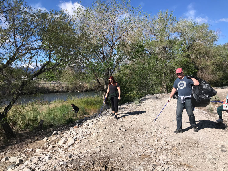 Aventura Clothing employees participating in Truckee river cleanup. 