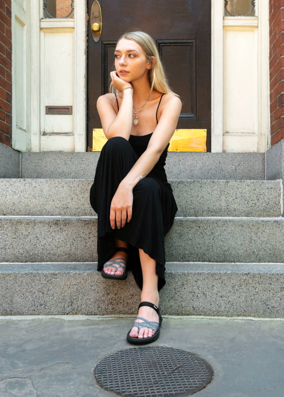 woman wearing comfortable sandals with a fancy dinner dress