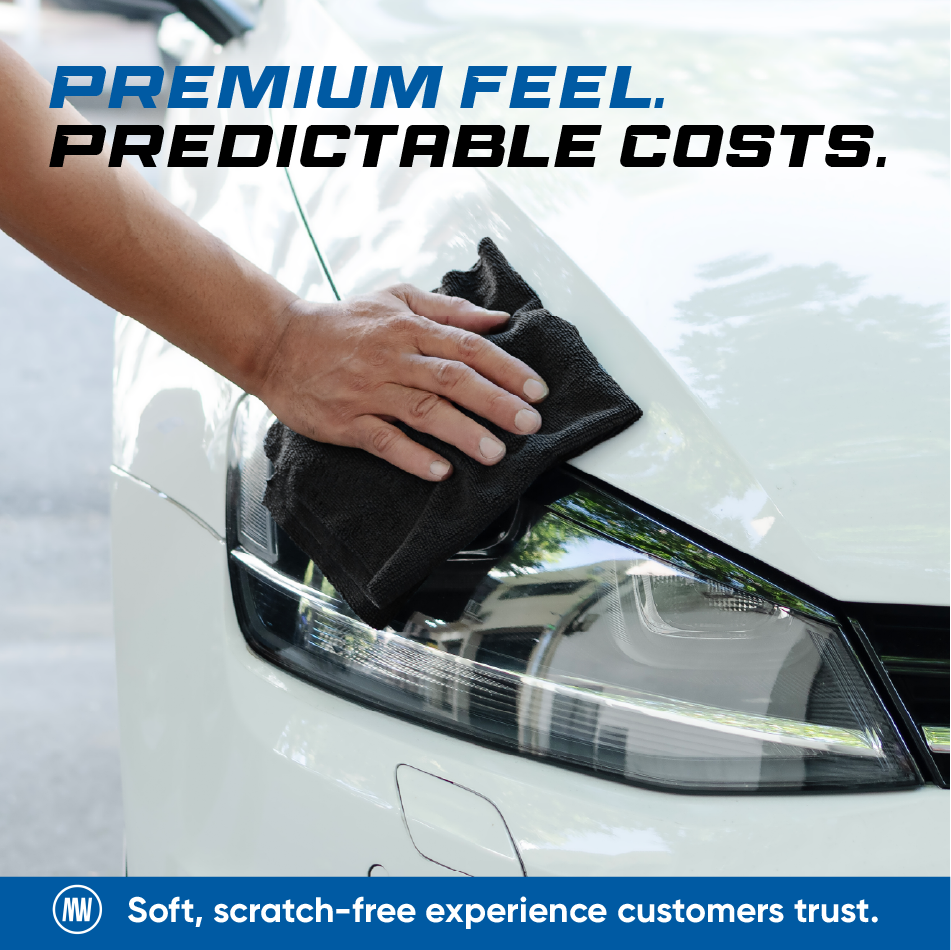 Person cleaning a car headlight with a cloth, promoting a service.