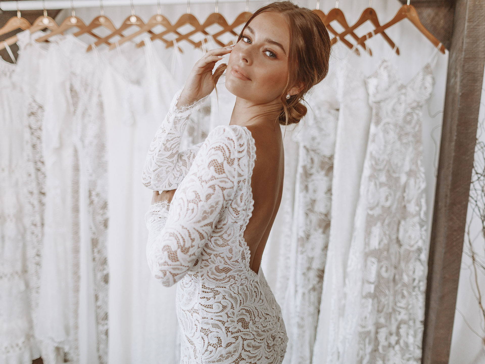 Bride in the Grace Loves Lace showroom wearing the Olive wedding dress