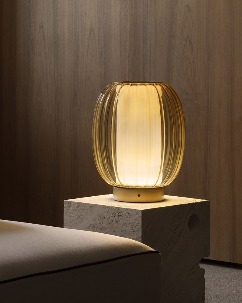 A decorative Contardi lamp with a rounded design and soft illumination.