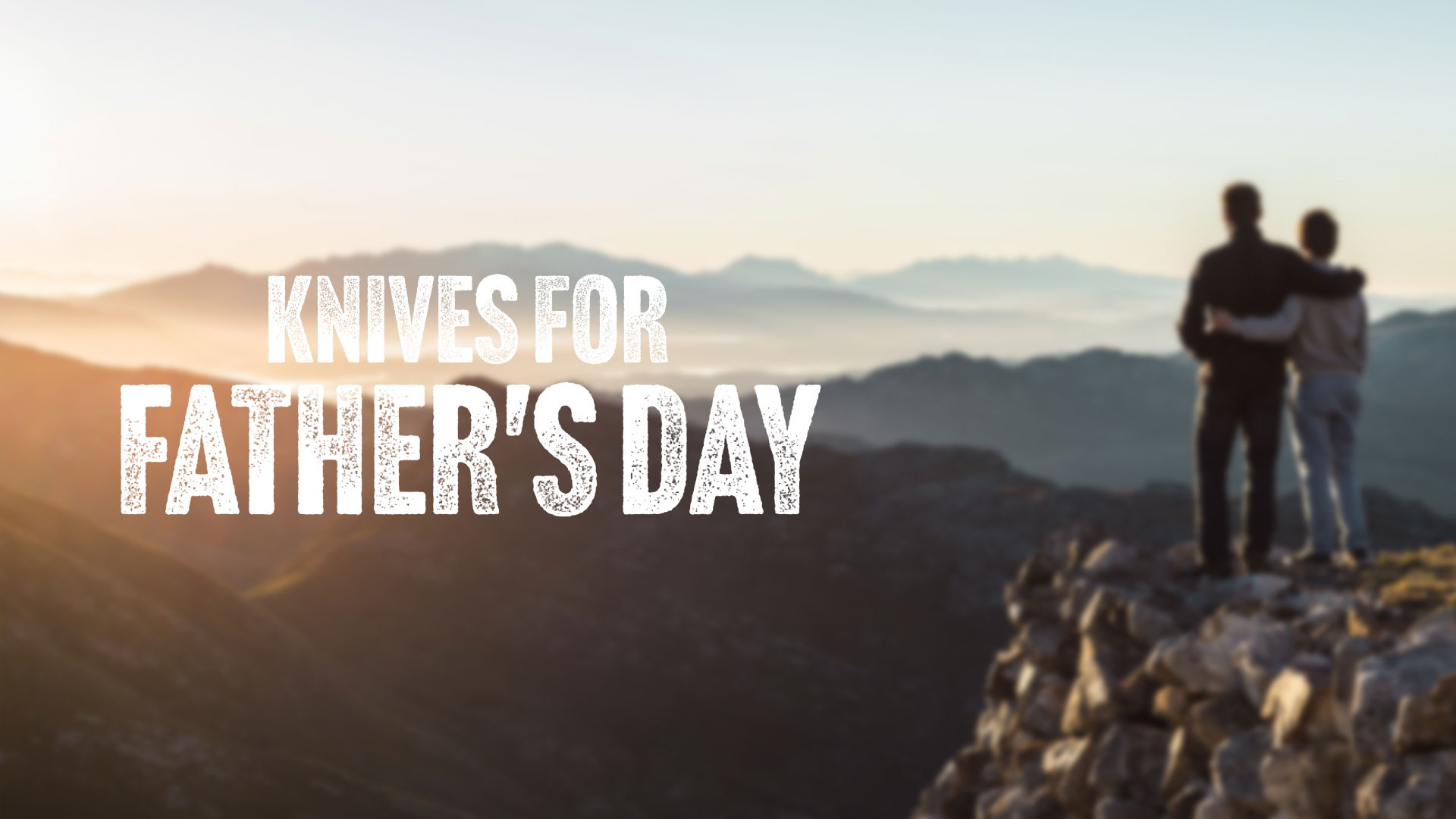Two people standing on a mountain, text: 