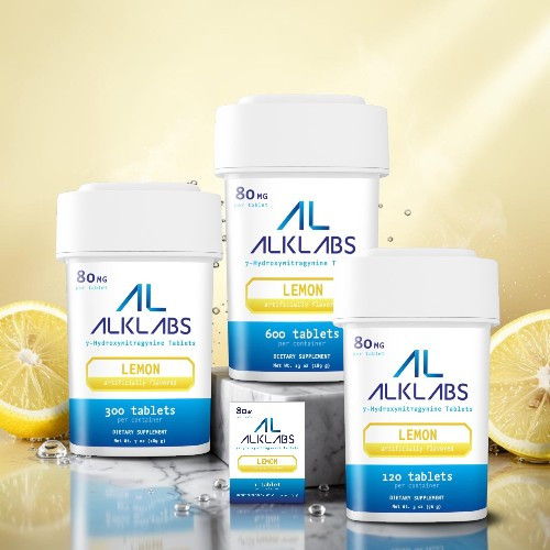Four bottles of ALKLABS lemon tablets with lemon slices in the background.