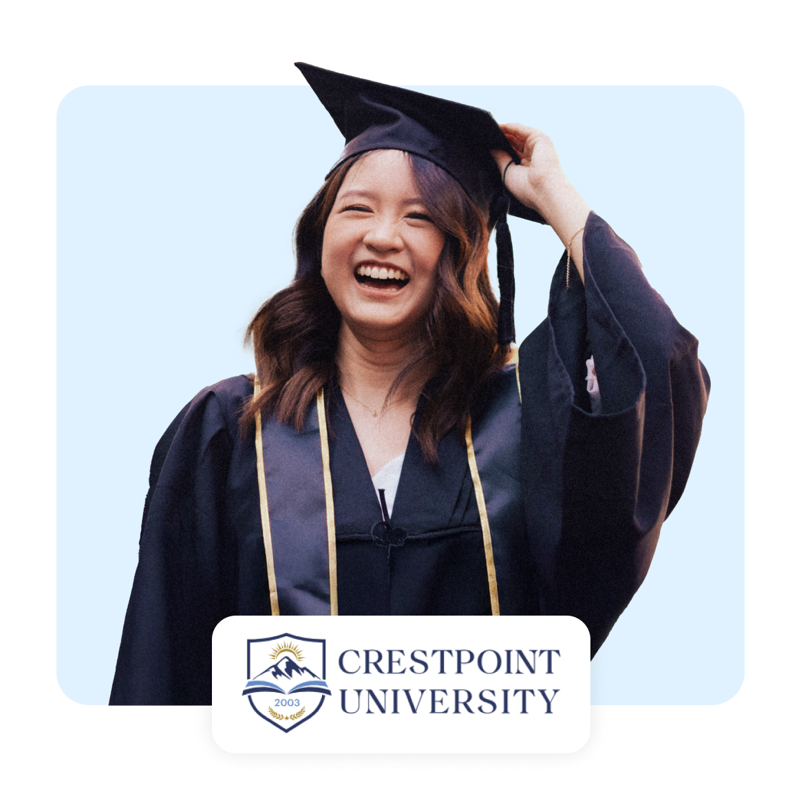 Happy graduate wearing a cap and gown at Crestpoint University.