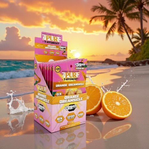 Colorful product box on a beach with oranges and a sunset background.