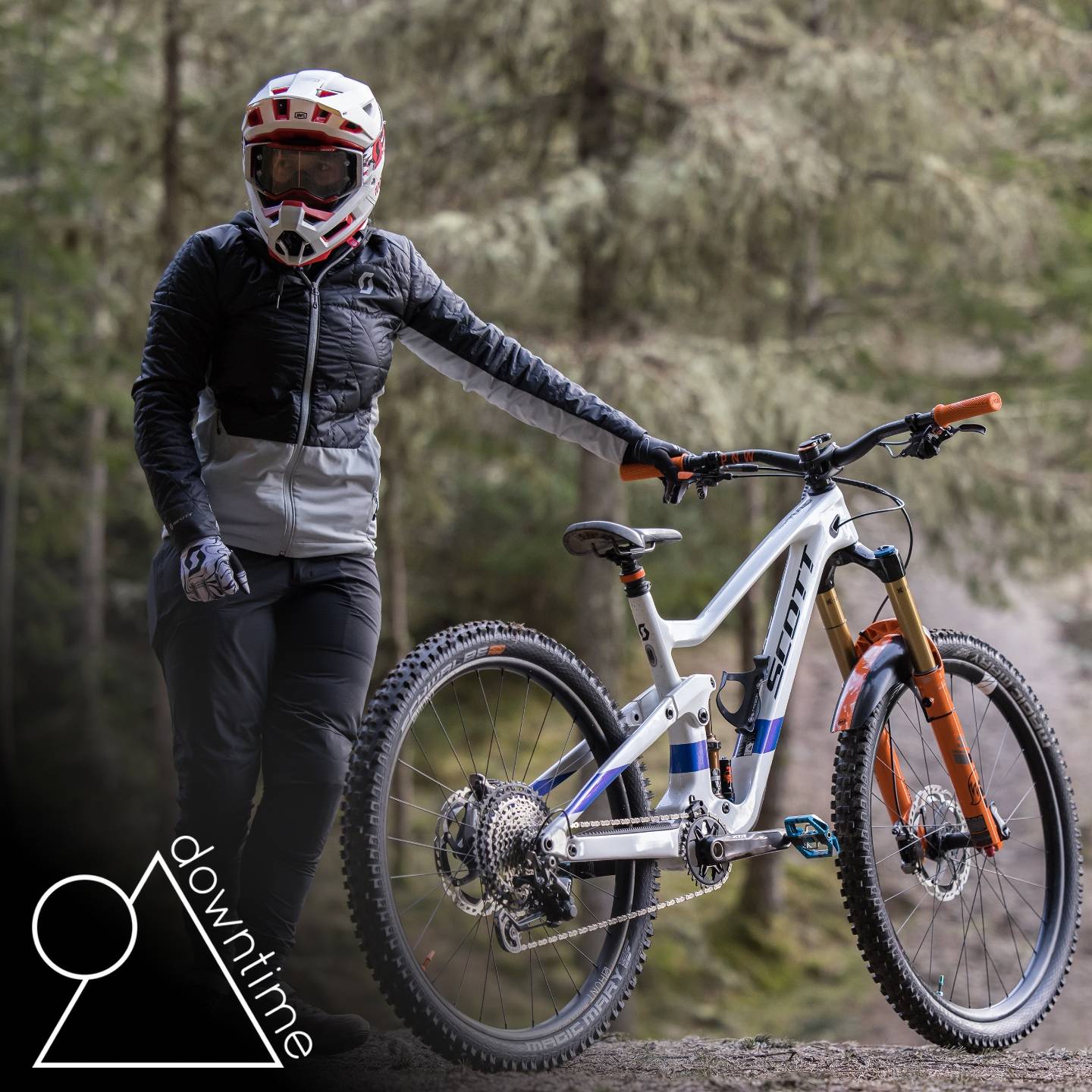 EWS Racer and Hunt mtb athlete, Chloe Taylor, posing with her full sus enduro bike 