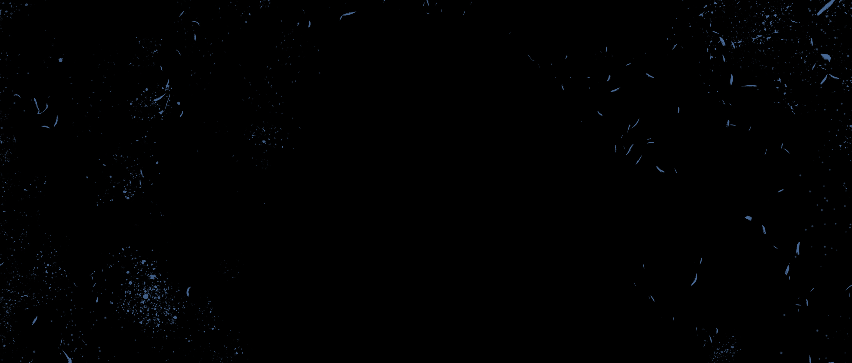 Black background with faint speckles resembling stars or distant light.