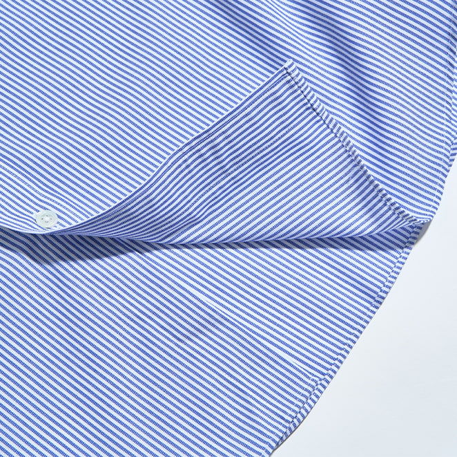 Blue and white striped fabric with a button detail.