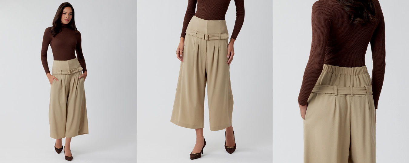 Model wearing a brown top and beige wide-leg pants.